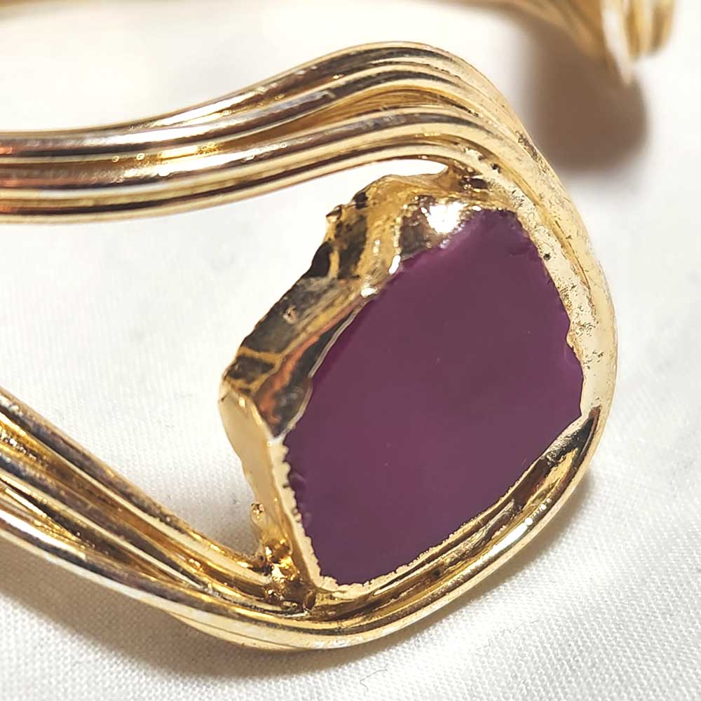 24K gold plated copper bracelet with a large purple agate gemstone on a woman's wrist, elegant and stylish