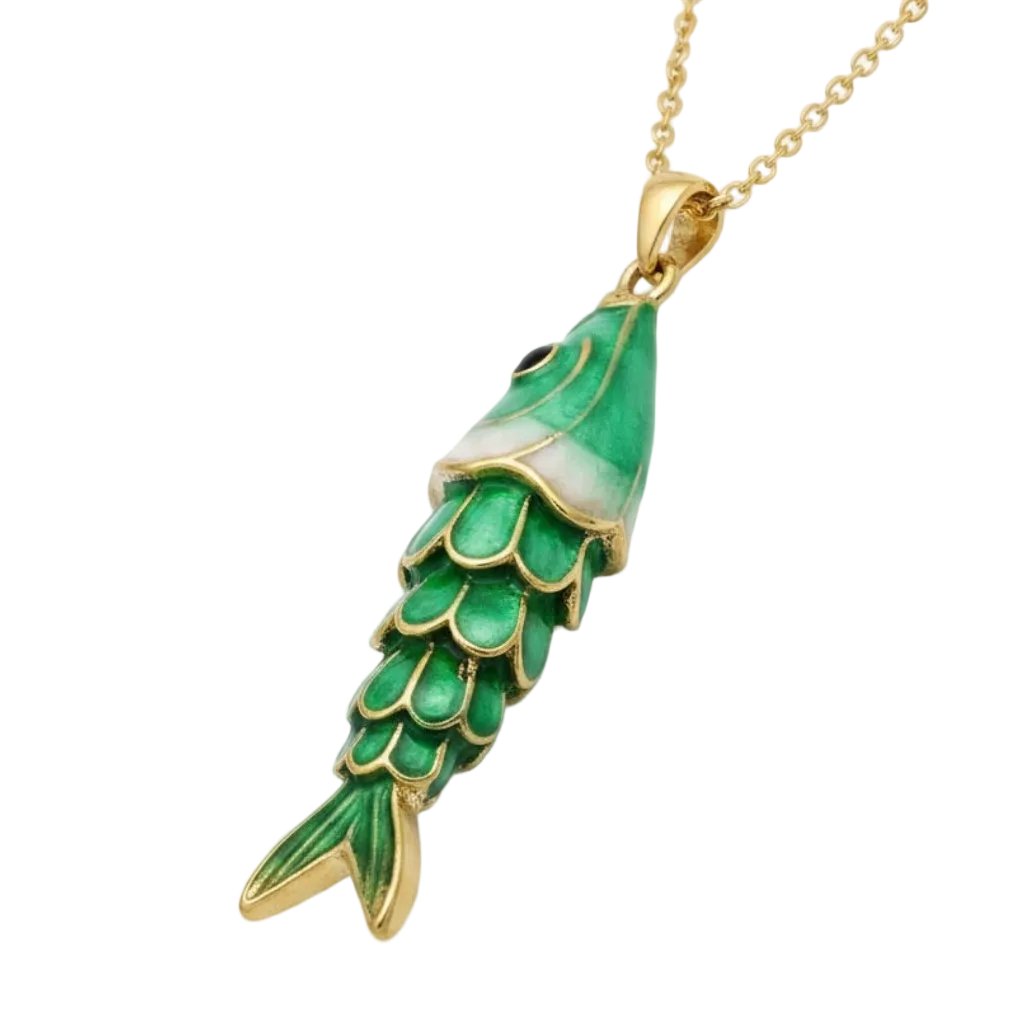 A gold chain necklace featuring a stylized fish pendant with green enamel scales and gold trim, set against a plain white background.