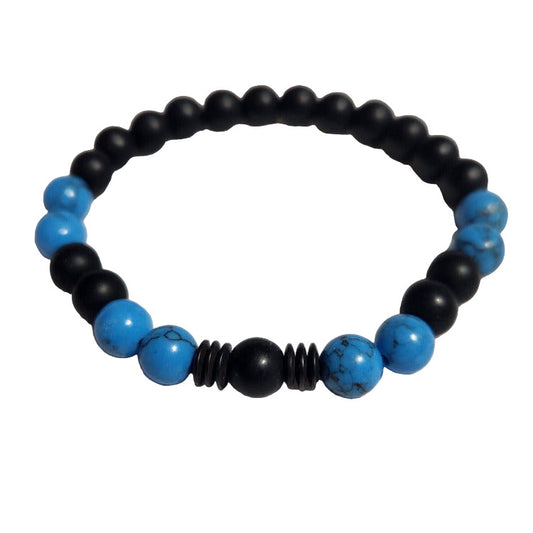 Black and blue beaded bracelet on a light gray background