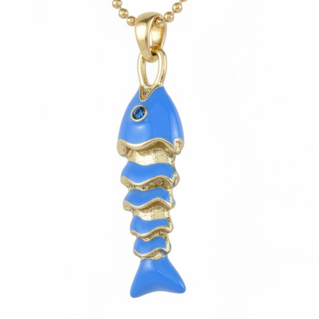 A gold ball-chain necklace with a fish-shaped pendant featuring bright blue enamel and small black eye details, shown on a plain white background.