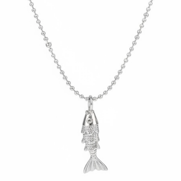 A silver ball-chain necklace with a small fish pendant, shown against a plain white background with a soft shadow underneath.